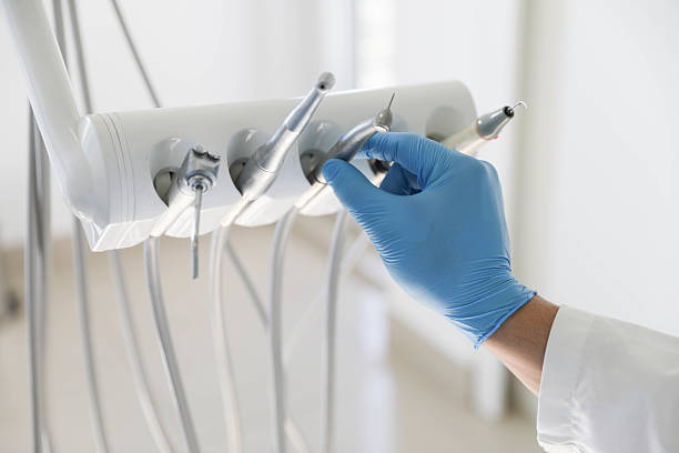 Professional Invisalign Clear Aligners technician working in Mastic Beach, NY